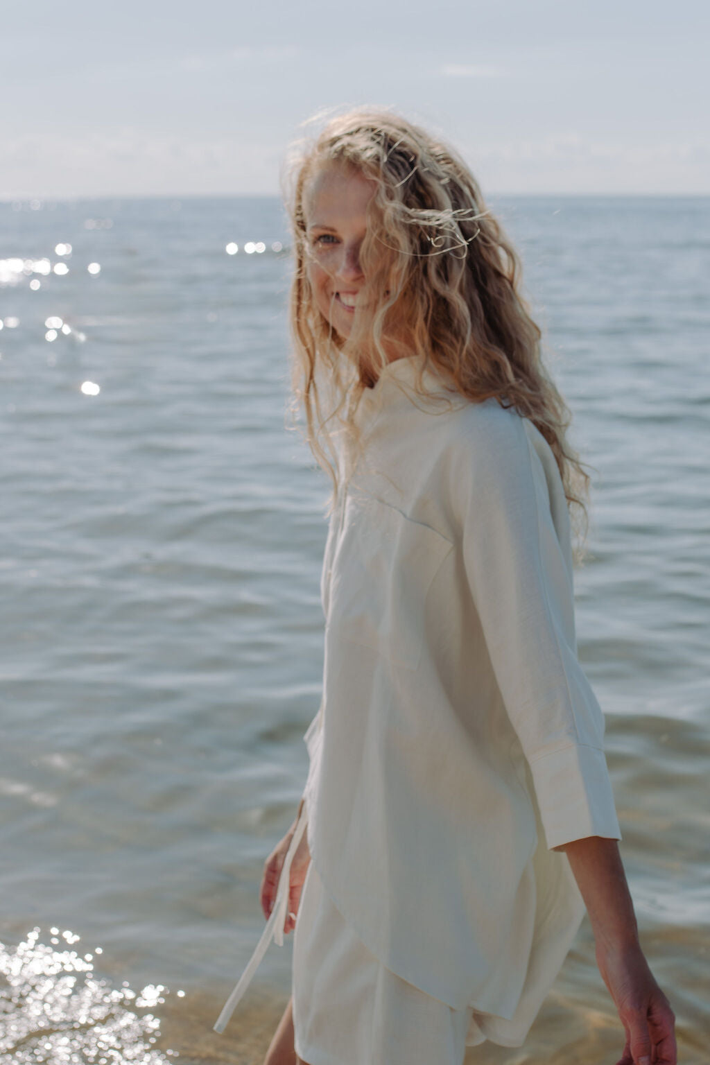 High quality women oversized linen shirt in off white, this oversized shirt is made from breathable linen fabric. Get linen shorts for women linen set.