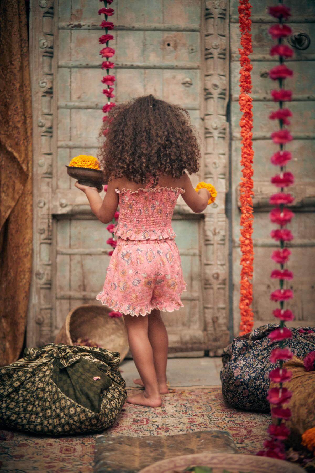 Organic cotton girl shorts in pink, breathable with elasticated waist by Louise Misha. Best kids sustainable clothing & organic cotton kids clothing online.