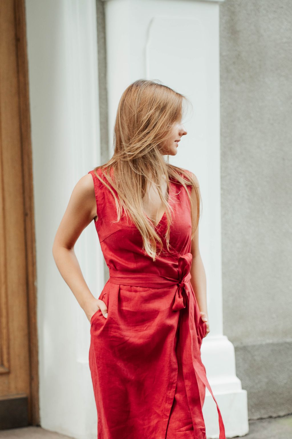 Singapore-inspired red linen wrap dress with adjustable tie.