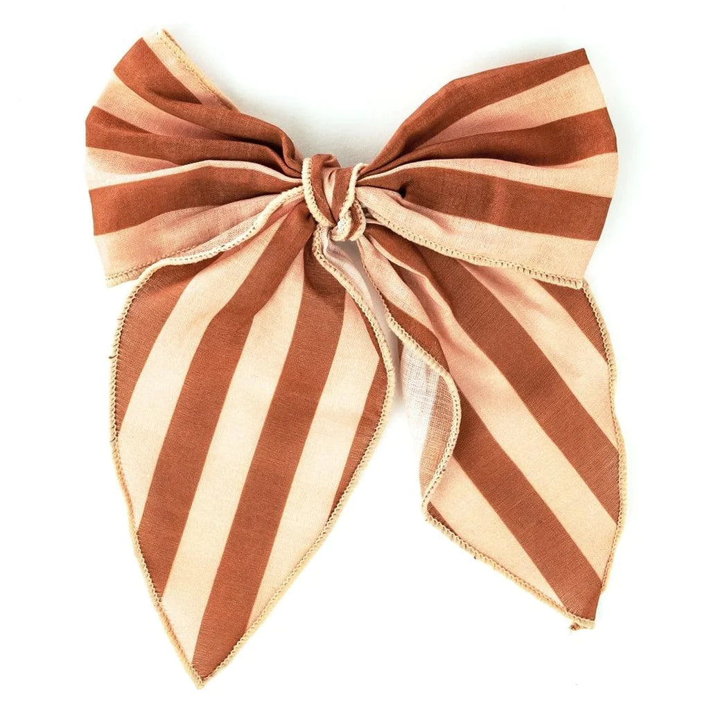 Shop the beautiful fable mid-size bow hair clips come in the sunset, and the tierra colour  online in Hong Kong and Singapore at MiliMilu. The big bow clip is gentle to the hair with a strong grip and are made with 100% OEKO-TEX organic cotton by Grech& Co. Perfect girls   and tween gift and Christmas stocking filler!