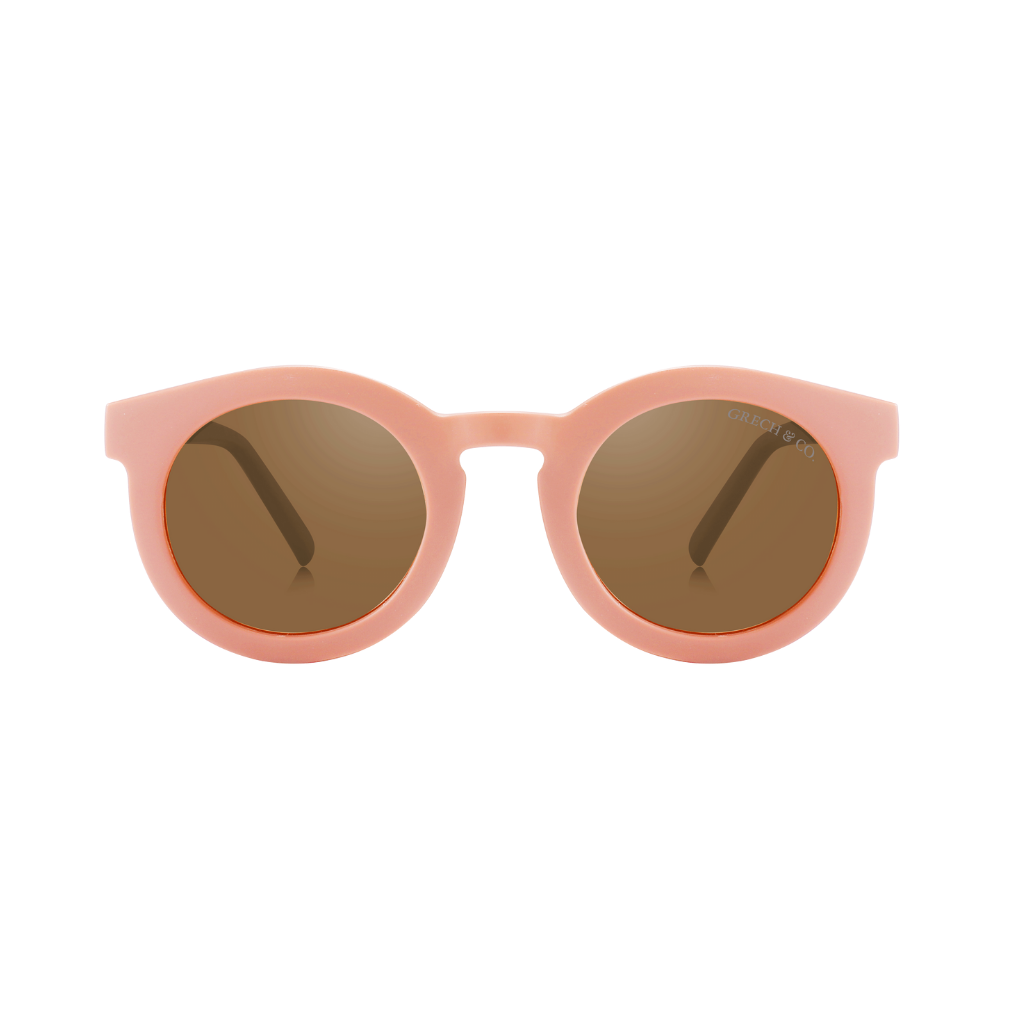 These sustainable pink kids sunglasses from Grech & Co, are made for the sun and fun. These cool pink kids' sunglasses, the perfect kids' accessory, are made from an eco-friendly/non-toxic break-resistant material. With its flexible kids sunglasses have polarized lenses. Matching sunglasses are available!