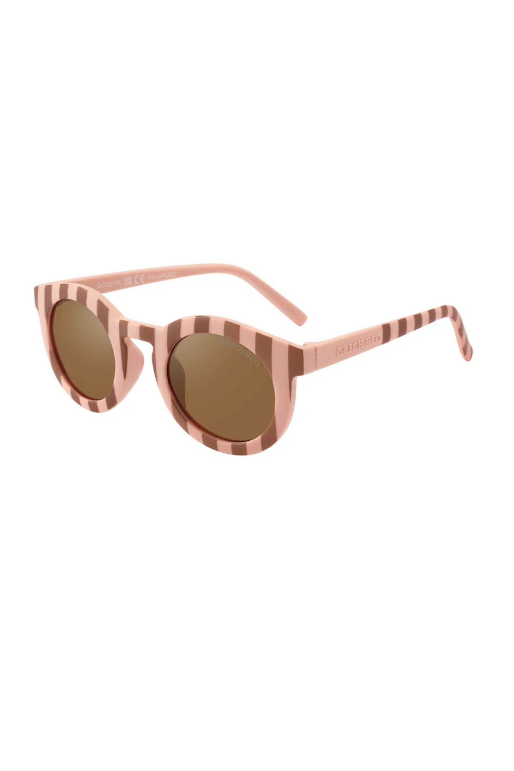 Sustainable sunglasses in pink and red for women by Grech & Co are eco-friendly with polarised lenses and UV400 protection. Mini Me styles are available.