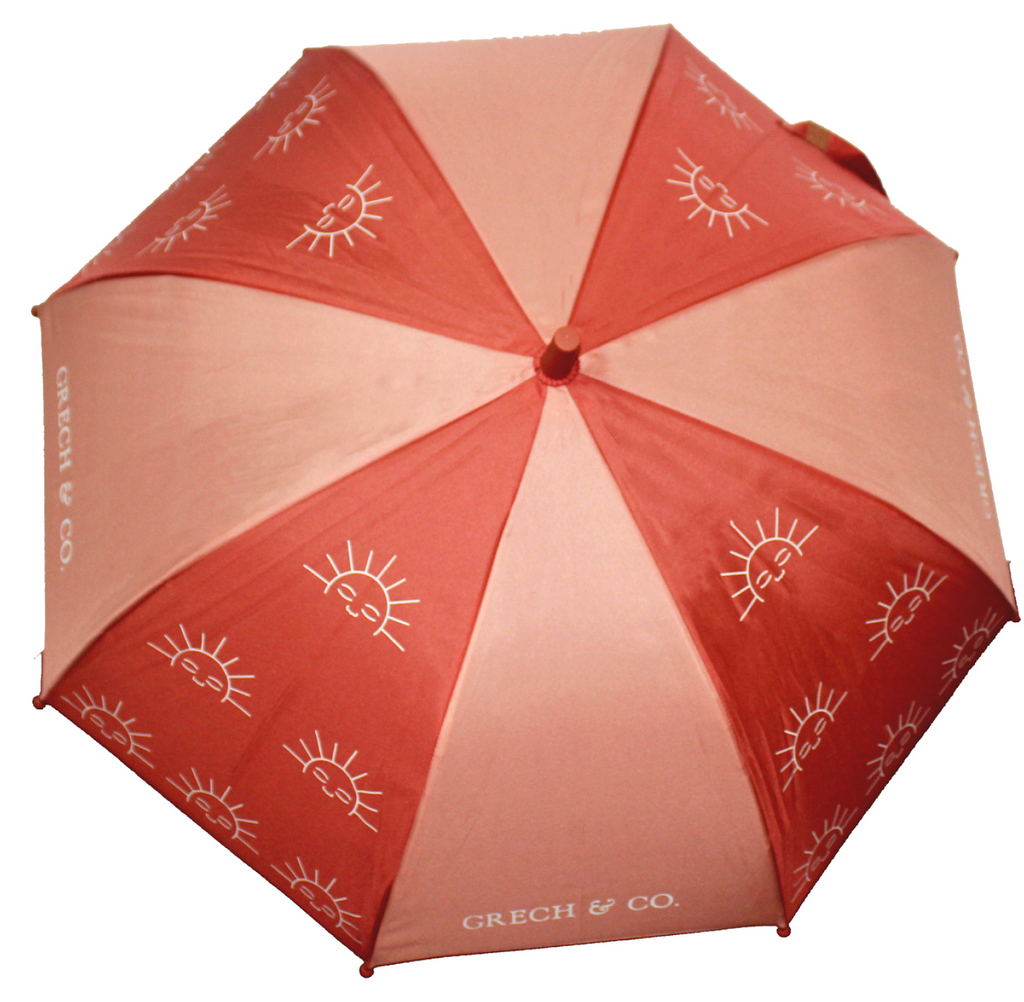 Our new sustainable kids' umbrella in pink colour from Grech&Co is proudly made with sustainable and eco-friendly materials. The umbrella fabric is made from recycled used bottles turned into recycled polyester fabric - and is biodegradable! Mini me styles are available. Shop kid's umbrellas online in Hong Kong.