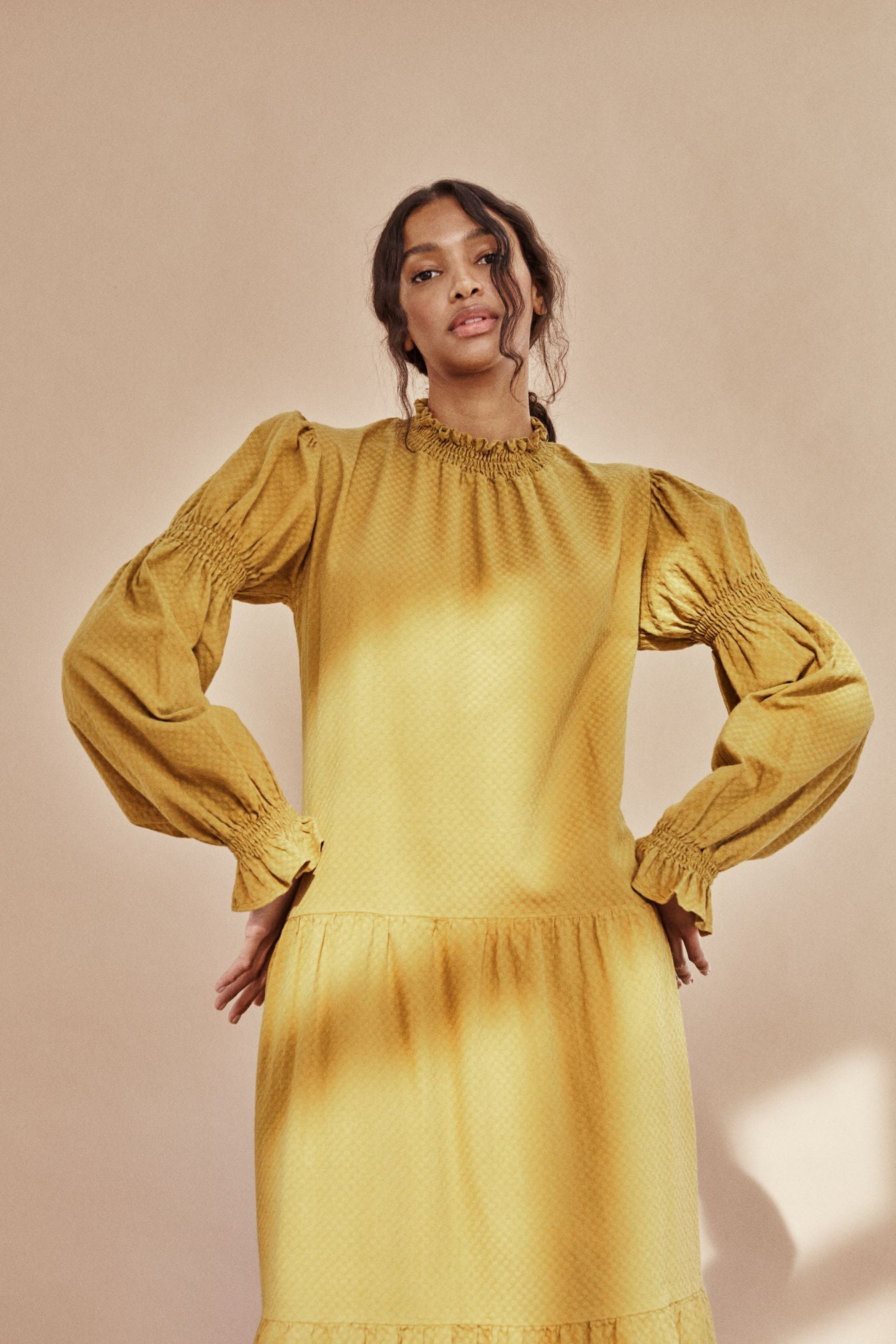 The breathable organic cotton women maxi dress online. This dress is flowy and lightweight, made with organic cotton in mustard colour by The New Society. The women midi dress is trendy and comfortable.