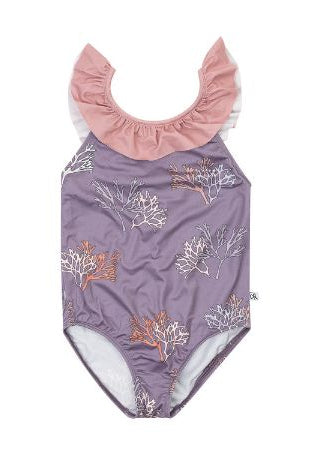 Girl wearing CarlijnQ coral recycled swimsuit beach pool summer sustainable fashion HK SG AU