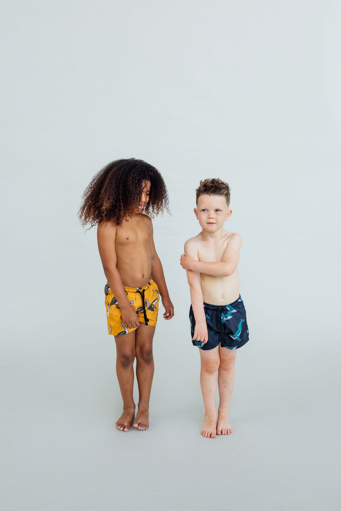 The boy swim shorts with whale print are a must-have for every boy's wardrobe, comfortable, waterproof and perfect for fun day by sea or lake. The swim shorts are made with reprieve fabric, which is polyester made from recycled plastic bottles by CarlijnQ. Milimilu offers sustainable boys swimwear in Hong Kong.