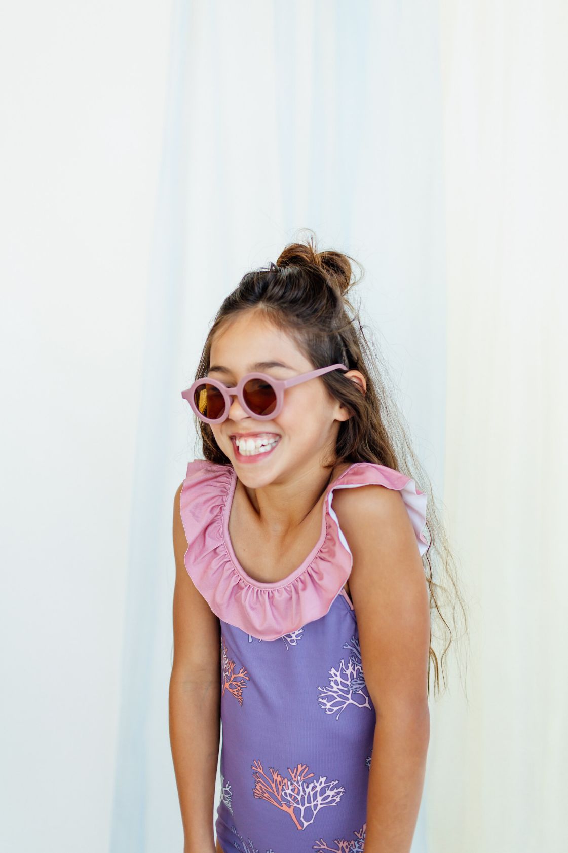 The recycled Coral swimsuit from The Ocean and Me collection are a must-have for every girl's wardrobe, comfortable, waterproof and perfect for fun day by sea or lake. The recycled Coral swimsuit is made with reprieve fabric, which is polyester made from recycled plastic bottles by CarlijnQ. This Eco friendly and light recycled Coral swimsuit will make you feel comfortable while having fun with family and friends.