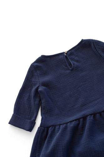 Beautifully handcraft our Back to Nature navy girls dress with 3/4 sleeves for cooler weather from organic cotton to bring you closer to nature with the freedom it gives you. This product is made of 100% organic cotton (GOTS).  This sustainable girls' dress is comfortable and soft. Mommy and Me styles are available.