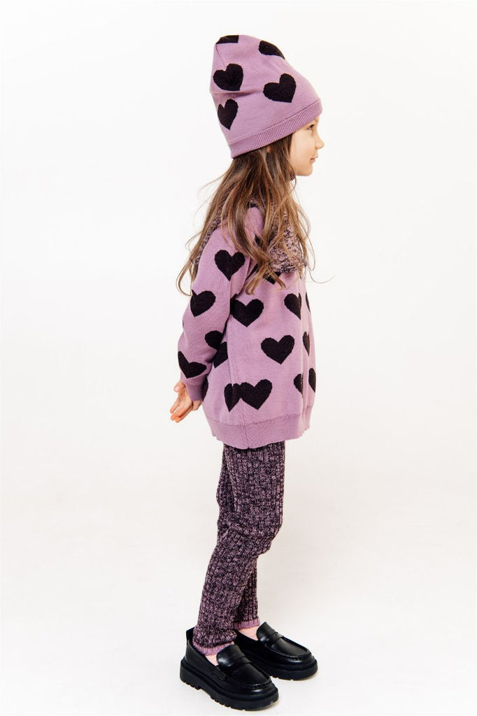 Shop soft and breathable merino wool hat in dark pink colour with hearts to keep your child warm in style. Soft and gentle to the skin and doesn't make it itchy so easy to wear and kids keep it on, made with 100% merino wool. Shop baby and kids winter clothing and winter accessories online in Hong Kong and Singapore.
