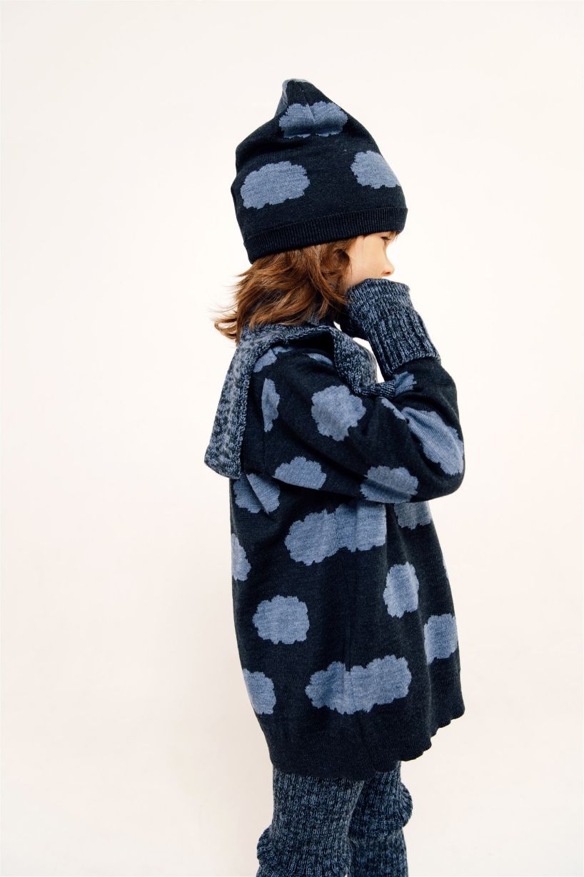 Shop soft and breathable merino wool hats for kids in blue colour with clouds to keep your child warm in style, made with 100% merino wool. This kid's winter hat/beany will ensure that your kid is comfortable (not itchy) and it's breathable so the child won't overheat—the best and most thoughtful Christmas gift.