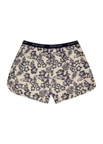 Hibiscus linen women shorts, blue floral print detail and fabric texture close up.