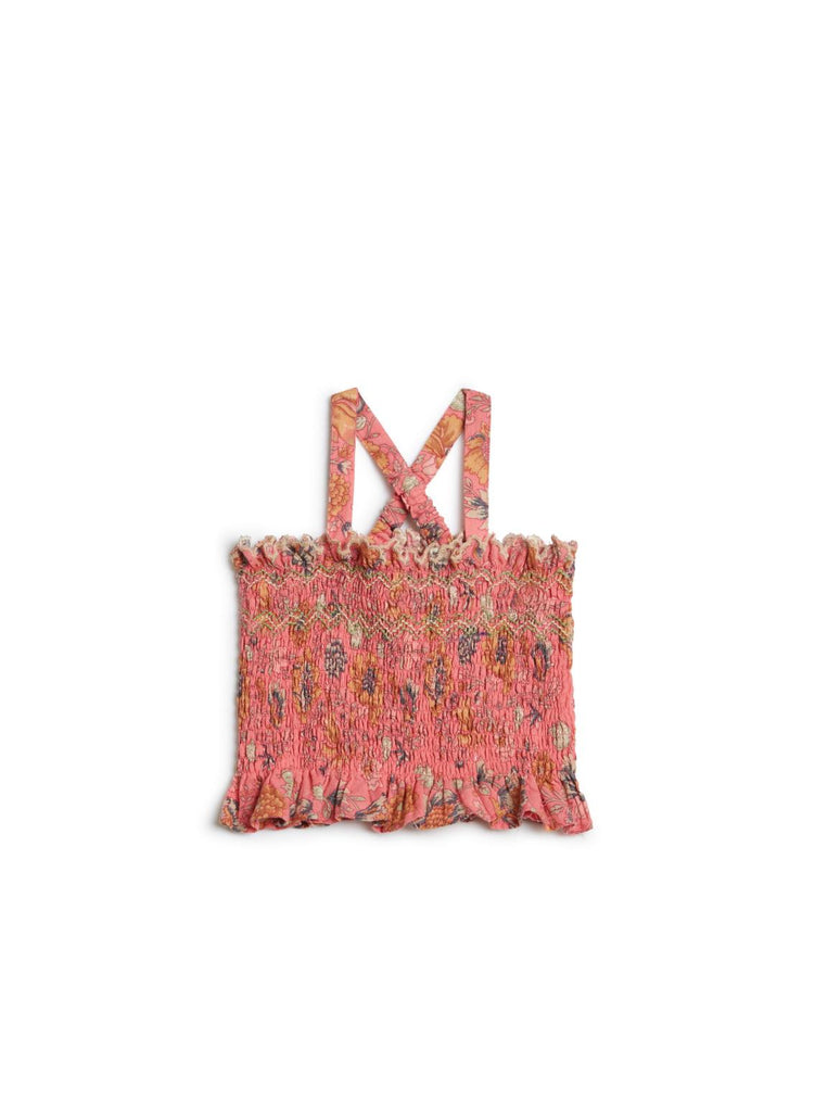 The pink organic cotton cropped girl's top is breathable and lightweight, smocked and in a bohemian strawberry print by Louise Misha. The organic cotton girl's pink top is girly, comfortable, and perfect for summer days and holidays. MiliMilu offers sustainable fashion for kids and babies from organic cotton.