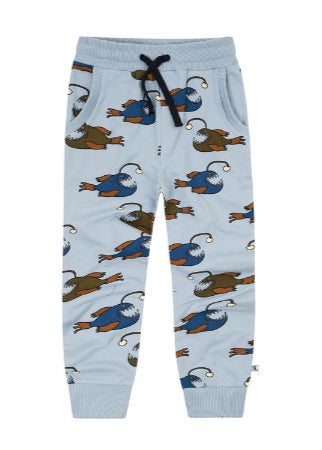 Anglerfish kids joggers flat lay, showing unique deep sea creature print design