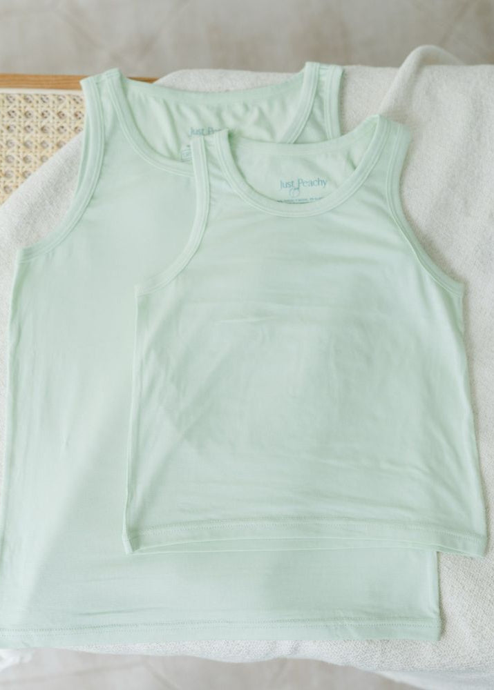 Kids tank tops in pink and green are made with Lenzing TENCEL Micro Modal Fibers. Kids underwear for sensitive skin eczema-prone skin at MiliMilu Lifestyle.