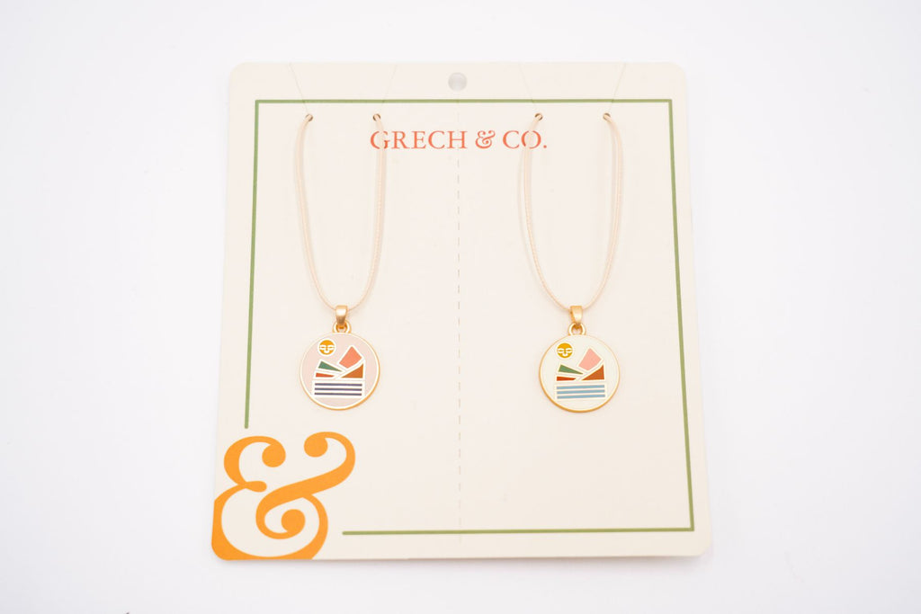 Shop girl's friendship necklaces online in Hong Kong and Singapore. This stylish landscape friendship necklace is made from eco materials ( alloy gold metal (enamel)) by Grech &Co. Come in a set of two necklaces to share with your bestie or mom. Perfect accessories and the best girls for girls on their birthdays.