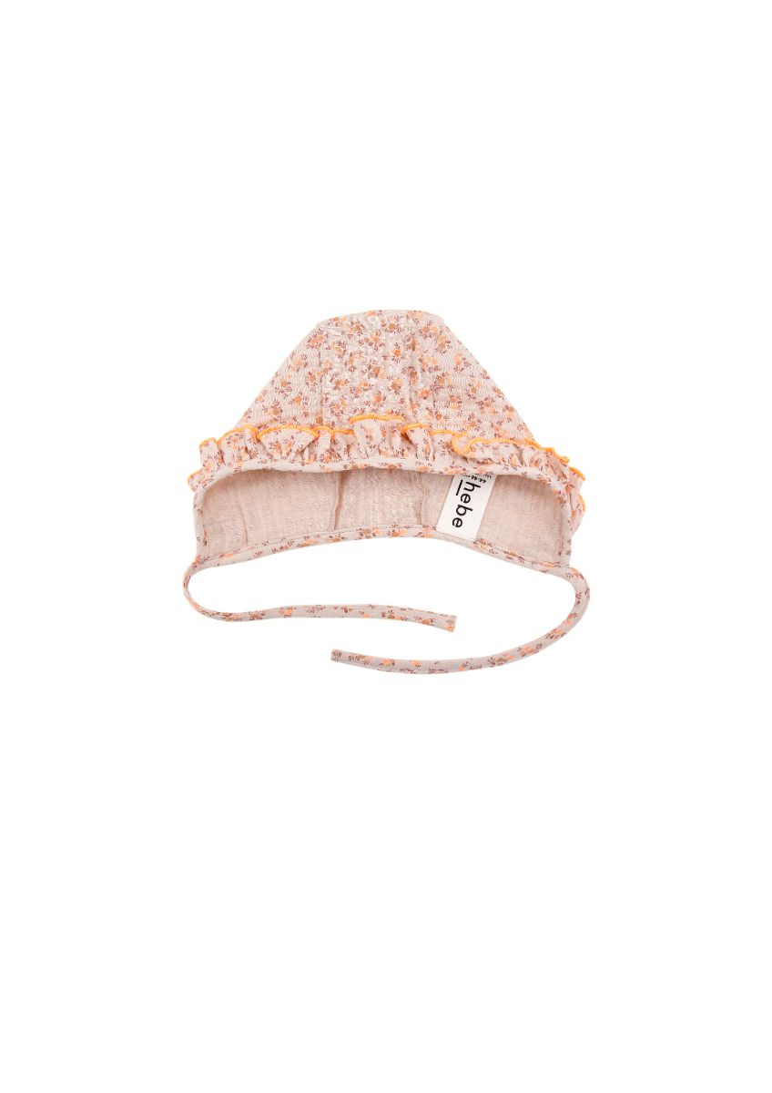 Pink muslin baby hat with ruffles and flowers, breathable organic cotton sun hat perfect for sensitive skin