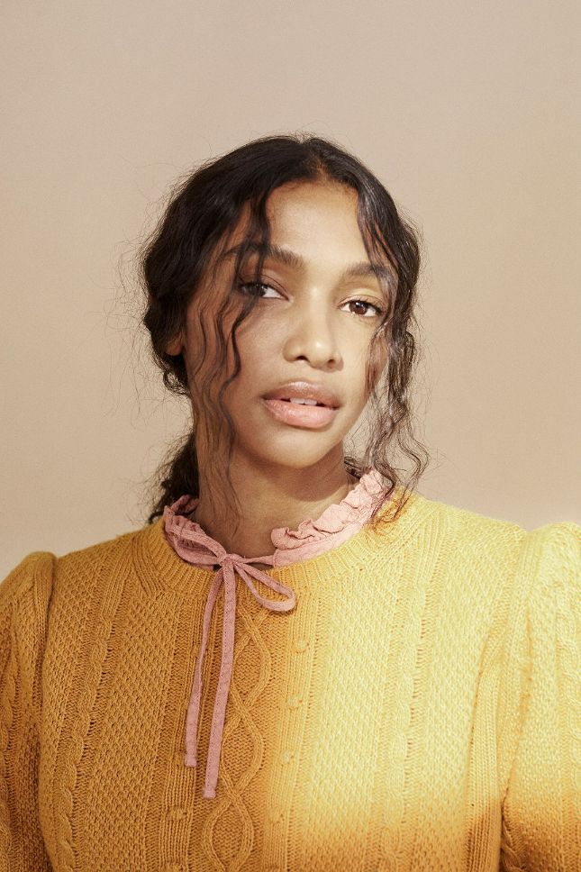 Recycled cashmere knitted jumper for women is super soft light and timeless in the mustard colour. The knitted jumper in mustard with puffy sleeves.