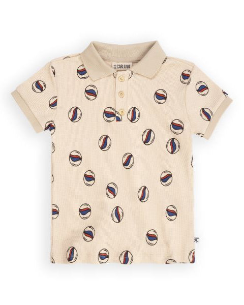 Organic cotton boys polo shirt with a stylish marble print. MiliMilu Lifestyle offers the best sustainable kids and teens clothing online.