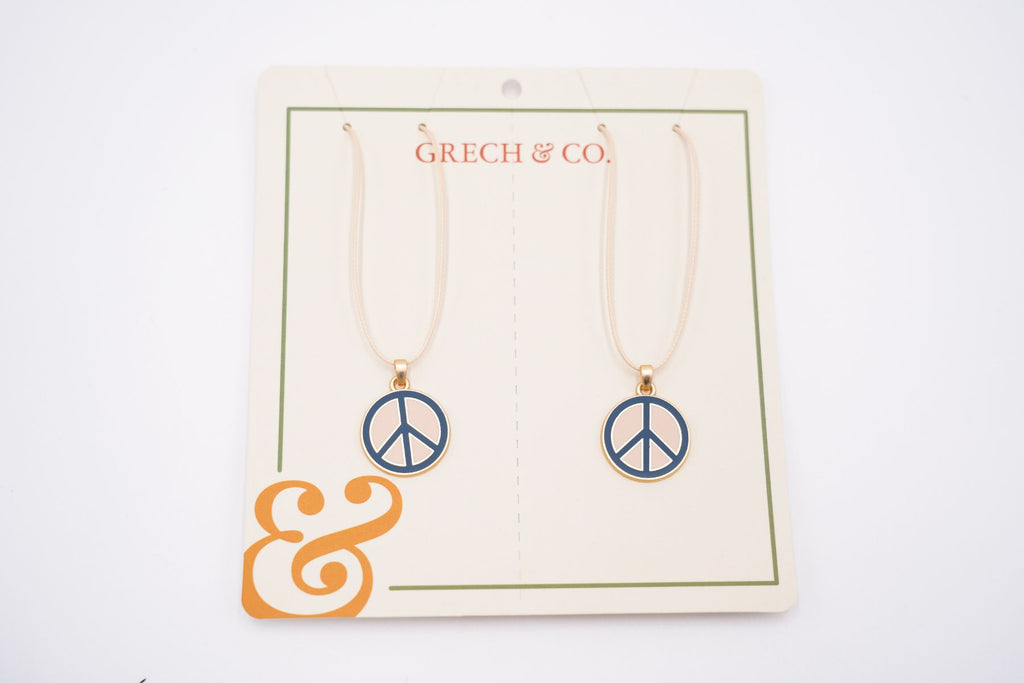 Gold and Silver Peace Sign Pendant Necklace | Uncommon James
