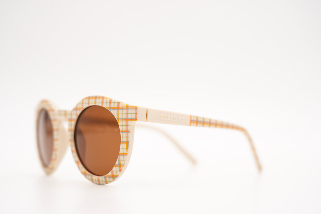 Shop sustainable kids' sunglasses in plaid patterns online in Hong Kong and Singapore at MiliMilu by Grech & Co. These kids’ sunglasses have polarised lenses and UV400 protection from the sun and these kids' sunglasses are unbreakable and eco-friendly sunglasses. Best gift for kids' birthdays and celebrations.