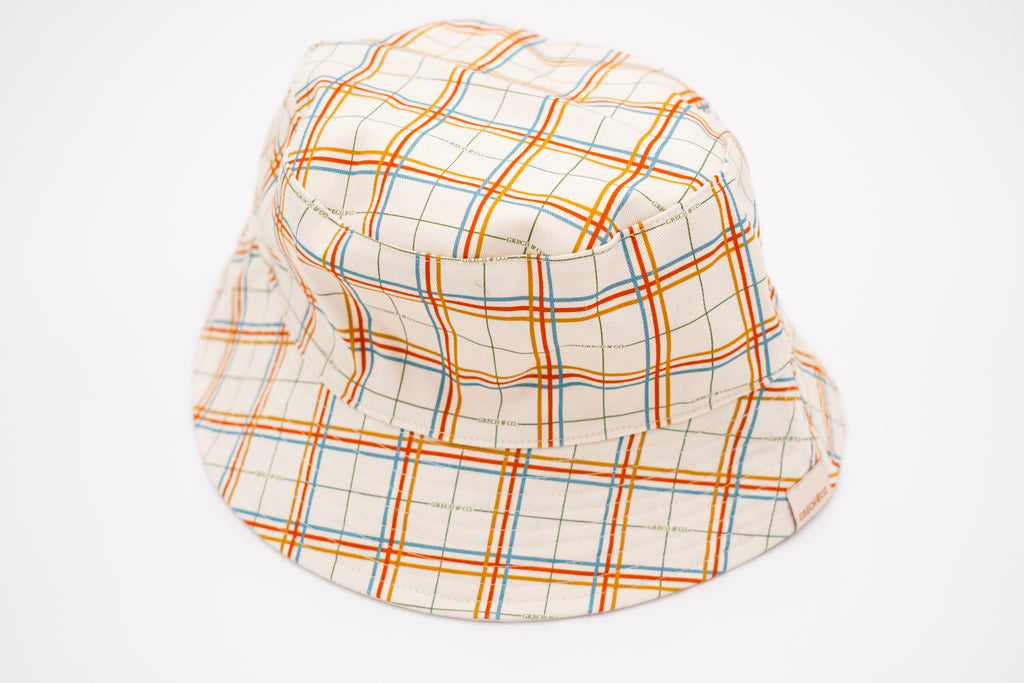 Shop kid's bucket hats online in Hong Kong and Singapore, This stylish kids reversible bucket in the plaid pattern is made with 100% Certified Organic Cotton (GOTS). Shop baby, kids and teen hats and summer hats for sun protection and style. Teenagers love our bucket hats that are comfortable and stylish.