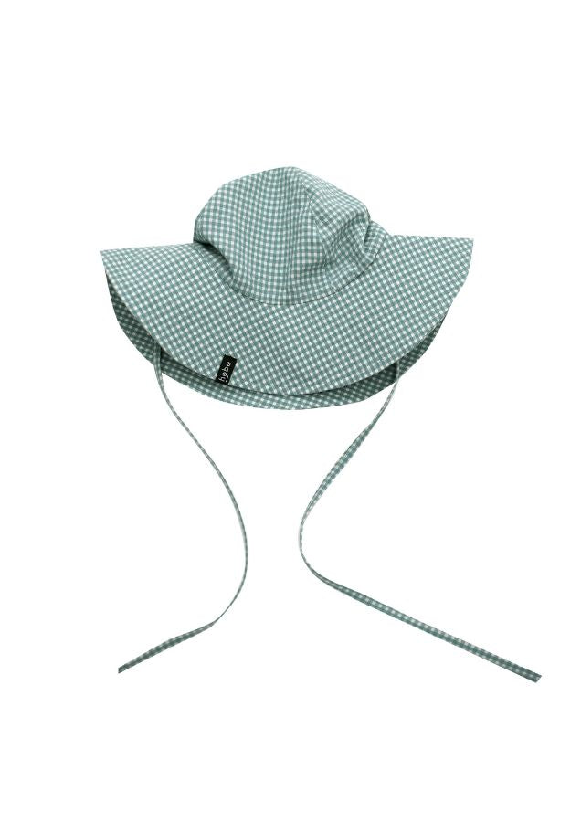 The light Mint Checkered summer hat for kids with straps to secure the hat. Mint Checkered kid's hat is made with lightweight organic cotton (GOTS) in green-blue checkered without any harmful chemicals. The Mint Checkered hat is made to protect you from the sun. Perfect kids summer hat for perfect summer.