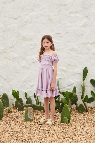 The breathable and organic cotton Terry Smocked girl's dress has is made with 100% organic terry cotton in Portugal by Liilu. A fashionable and sustainable way to elevate your child's wardrobe this season. We made sure your daughter is comfortable; fashionable organic cotton is gentle to your skin and nature. Mini-me styles are available for Mommy and daughter days out! Perfect dress for hot and humid weather.