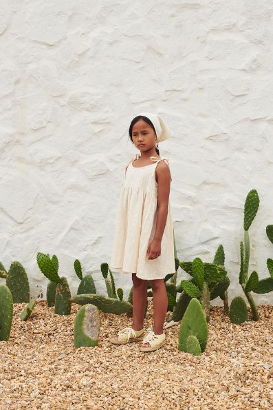 Shop the Louise girl's dress, made of organic cotton, featuring an adjustable shoulder strap and a loose, flattering cut. This dress offers breathability, comfort, and flowy. Mini Me dresses are also available. Check out MiliMilu's online collection of girls' summer clothing and dresses in Hong Kong and Singapore.