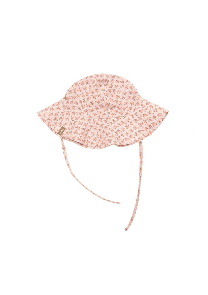 The breathable organic muslin girl's sun hat with a small floral print is the most adorable hat for summer and also for sun protection. This girly hat has straps to make sure that holds well while protecting your child from the sun and also add to the style. Milimilu offers sustainable kids clothing from organic cotton