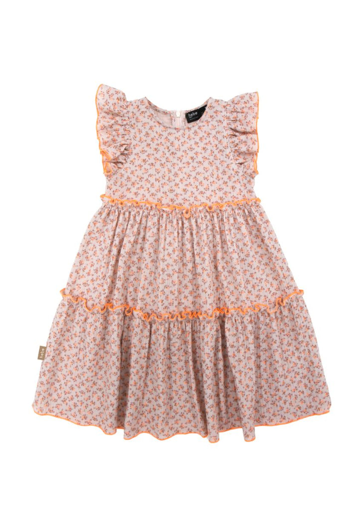 The breathable organic muslin girl's dress with ruffles and small floral print is the most adorable girl's outfit. The soft and breathable muslin girl's summer dress is perfect for hot and humid weather. MiliMilu offers sustainable clothing for kids from organic cotton that is practical and stylish for everyday use.
