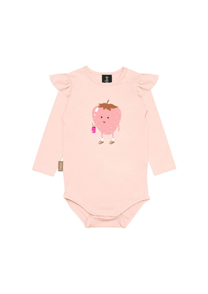 A breathable, organic cotton baby girl's body in light pink color with strawberry print and ruffles on the shoulders is comfortable and stylish for everyday wear. The breathable and comfortable baby girl's body will suit as an outfit for a day out and about with family. Milimilu offers sustainable baby clothing.