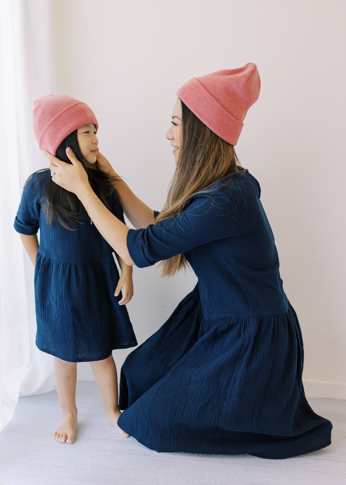 Artisans beautifully handcraft women's dresses in navy colour from organic muslin with 3/4 sleeves. Mini-me dresses are available on Mommy and daughters' days out! 