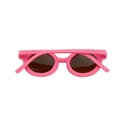 Sustainable kids sunglasses in bright pink by Grech & Co are made from eco-friendly break-resistant material - offering higher durability & longevity. 