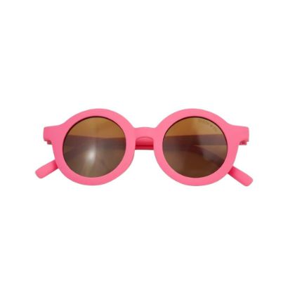 Sustainable kids sunglasses in bright pink by Grech & Co are made from eco-friendly break-resistant material - offering higher durability & longevity. 