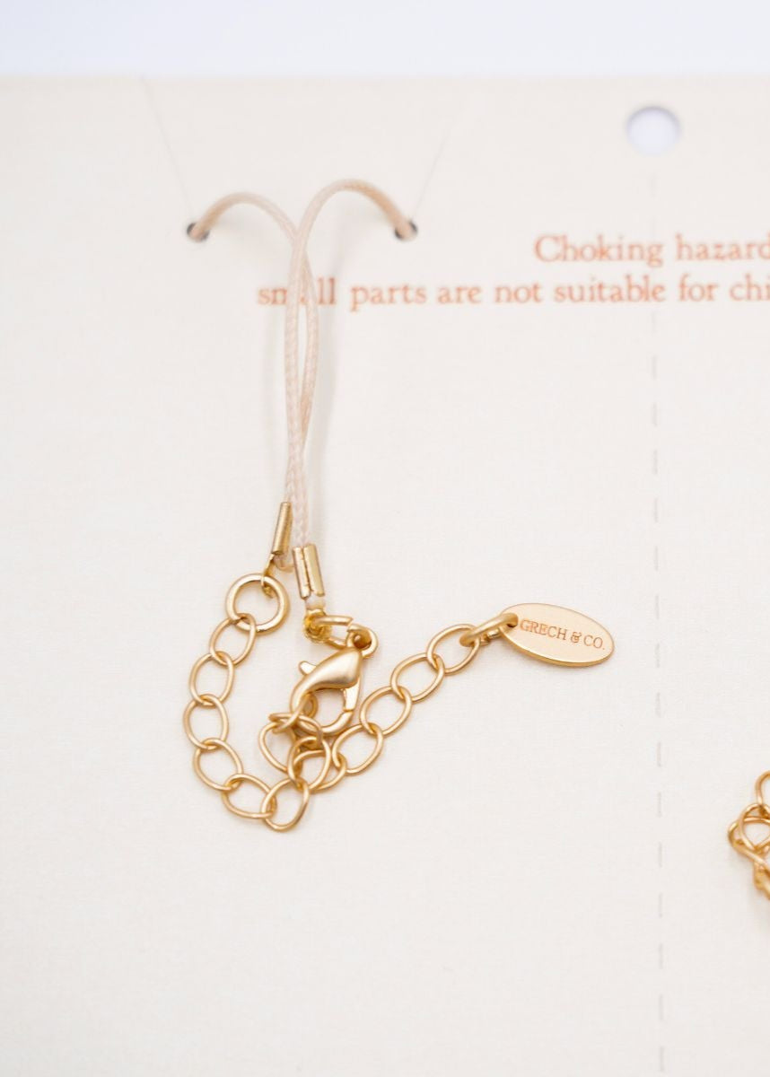 Shop girls friendship necklaces online made from eco materials (enamel) by Grech &Co. Come in a set of two necklaces to share with your bestie, the best gift.