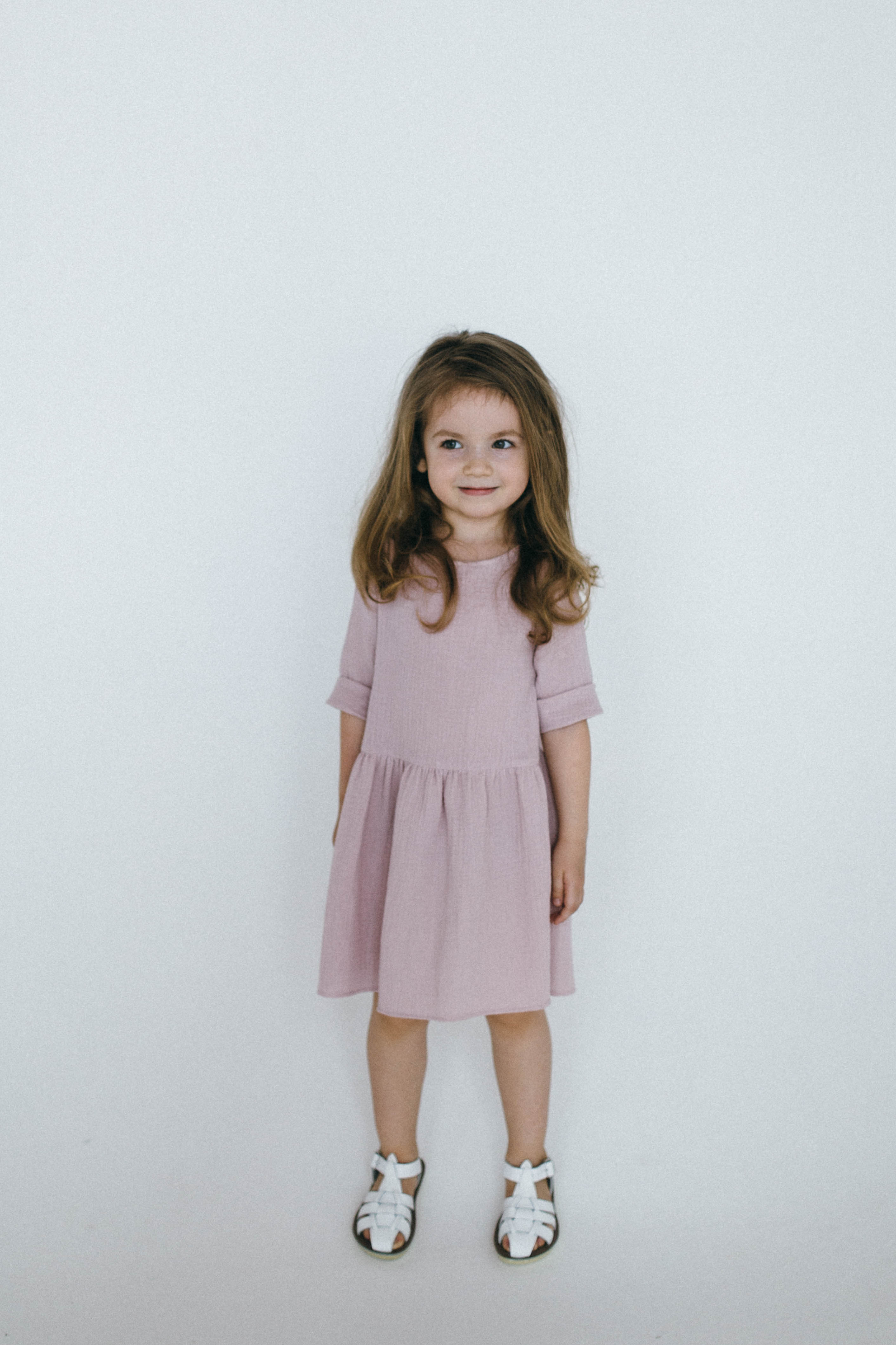 Beautifully handcraft our Back to Nature soft pink girls dress with 3/4 sleeves for cooler weather from organic cotton to bring you closer to nature with the freedom it gives you. This product is made of 100% organic cotton (GOTS).  This sustainable girls' dress is comfortable and soft. Mommy and Me styles are available.