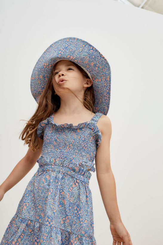 Breathable & lightweight liberty cotton girl dress with an open back is stylish and comfortable. The liberty cotton girl dress and Mini Me dresses online.