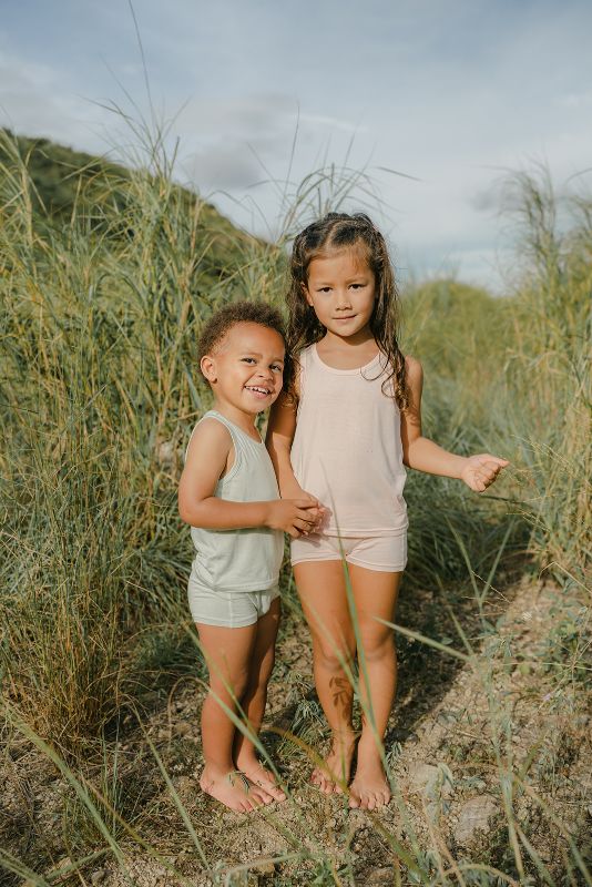 Kids tank tops in pink and green are made with Lenzing TENCEL Micro Modal Fibers. Kids underwear for sensitive skin eczema-prone skin at MiliMilu Lifestyle.