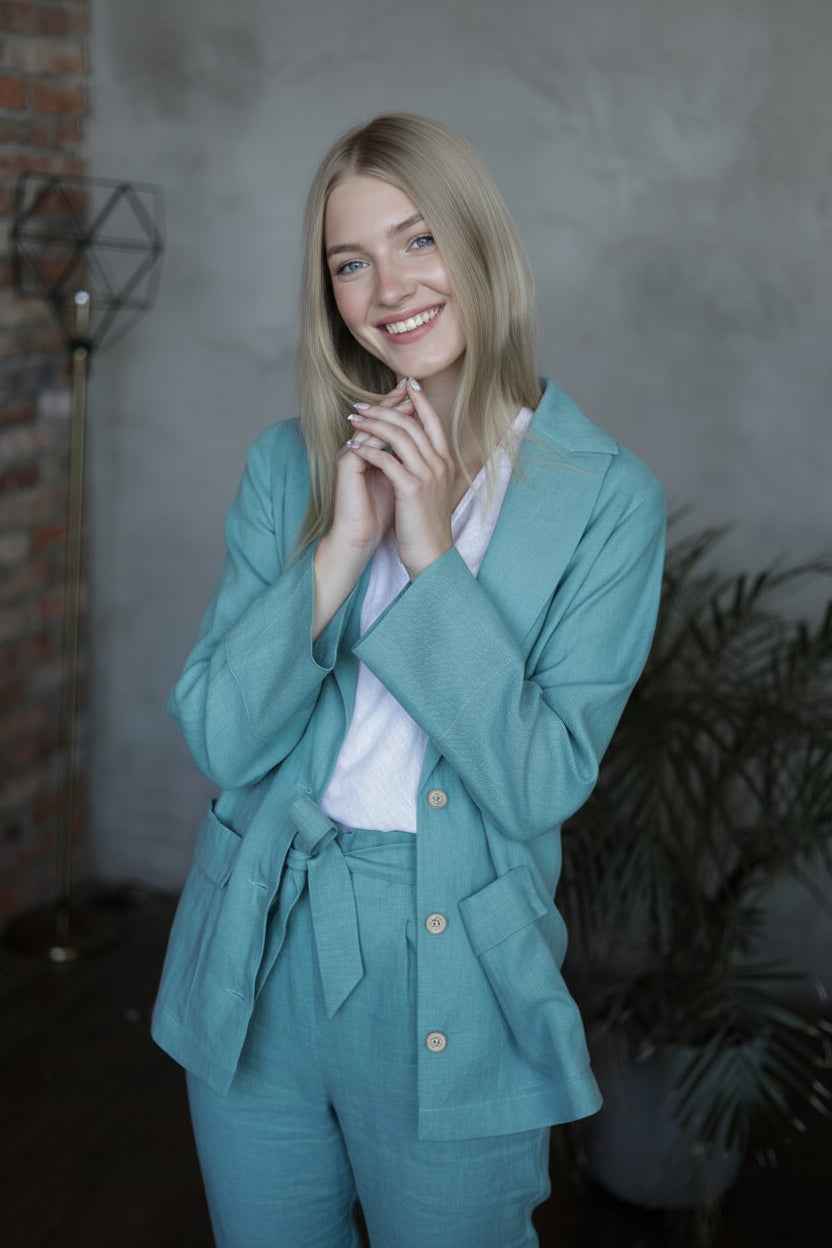 The womens blazer is a loose style jacket in Sea blue, handcrafted from the highest quality European linen. Shop sustainable, slow-fashion womens cothing.